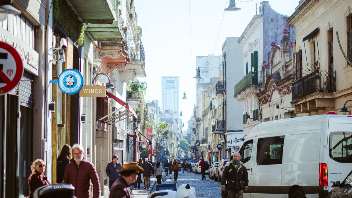 Pedestrians explore the historic streets, shops and architecture of Buenos Aires.