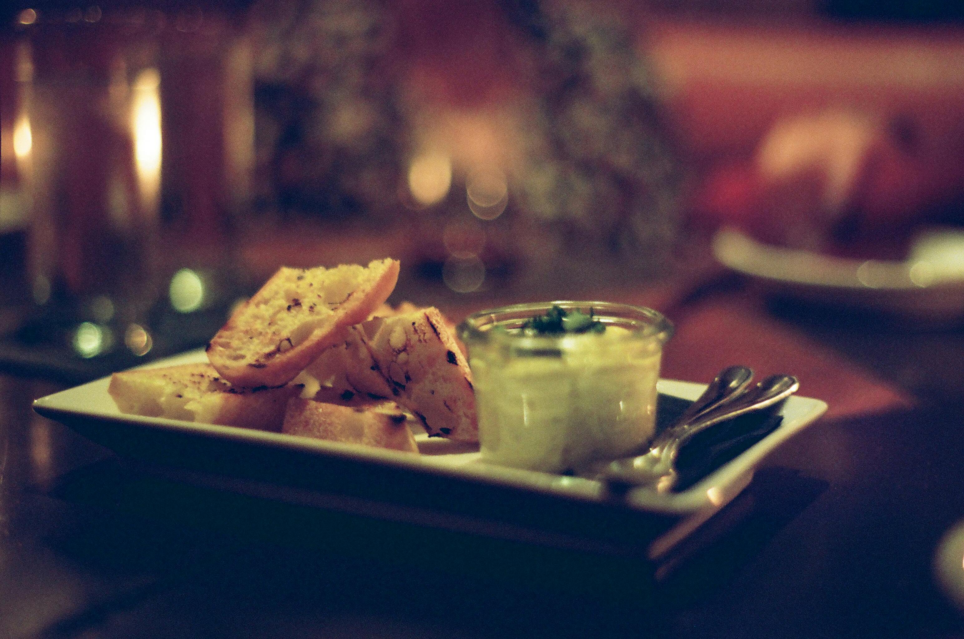 Finger food platter with dipping sauce at a party. Photo by Jaymantri from Pexels.