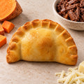 Golden Maverick empanada with beef, mozzarella and sweet potato.