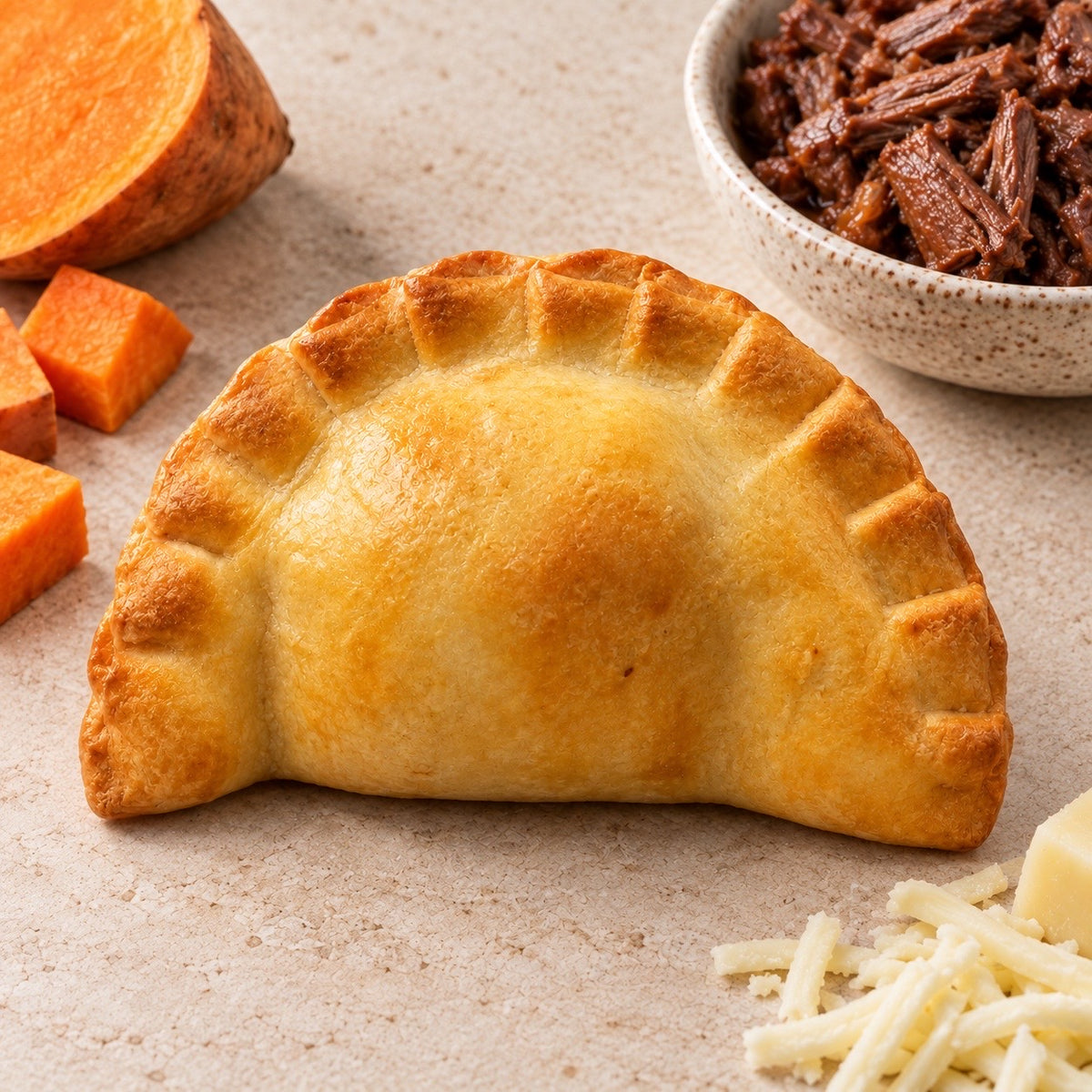 Golden Maverick empanada with beef, mozzarella and sweet potato.